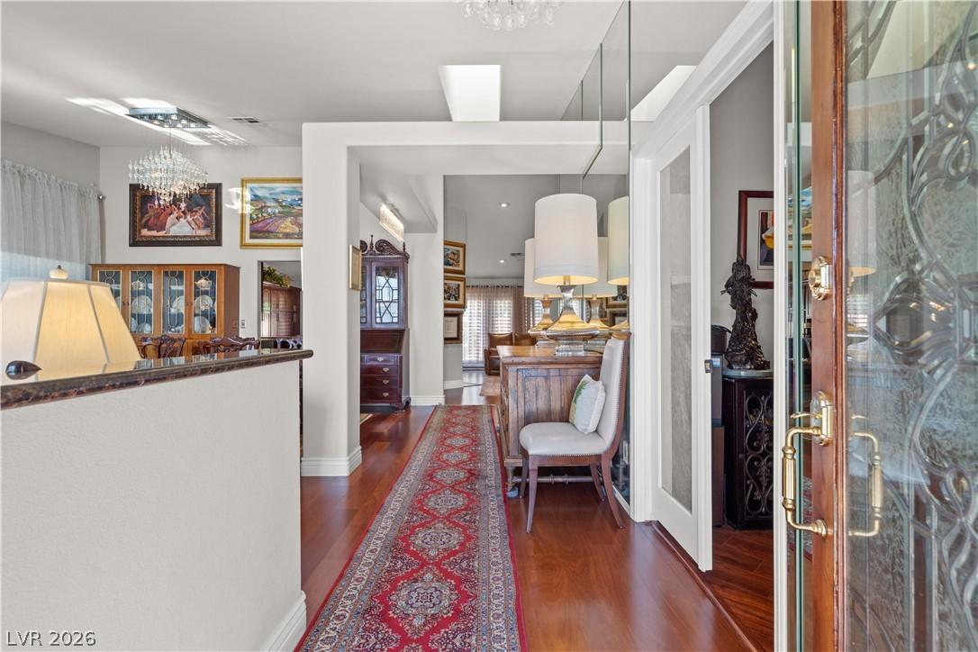 Image 4: Enter this home featuring exquisite hardwood floor