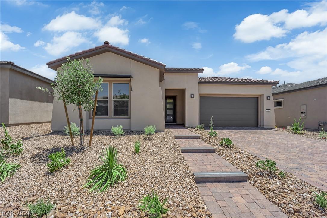 Image 4: A desert-friendly landscape surrounds this single-