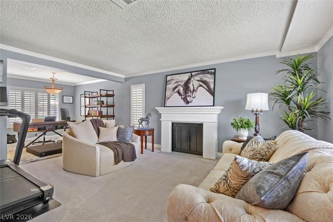 Image 4: Living room dining room area. Custom fireplace sur