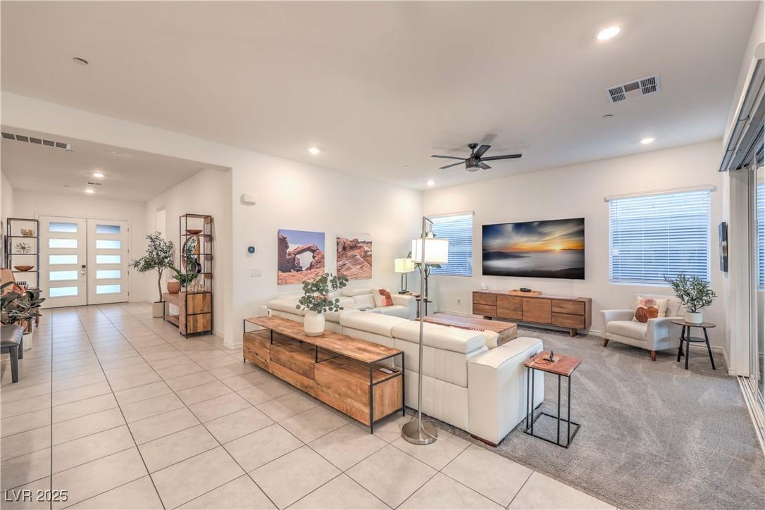 Image 4: Living area featuring ceiling fan and recessed lig