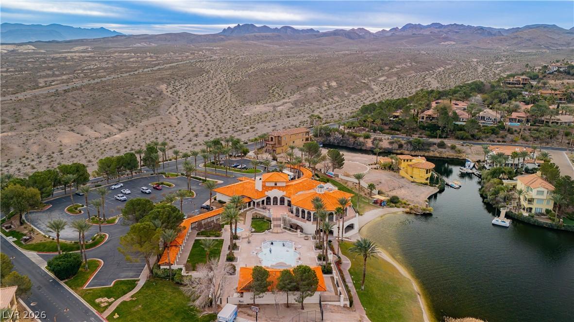 Image 2: A desert oasis with a private lake and luxurious c