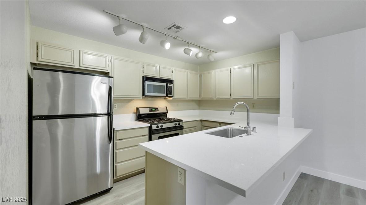 Image 3: New Quartz Countertop and freshy painted cabinets