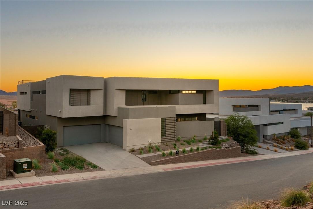 Image 1: View of front of home. Exterior Elevation  C - loo