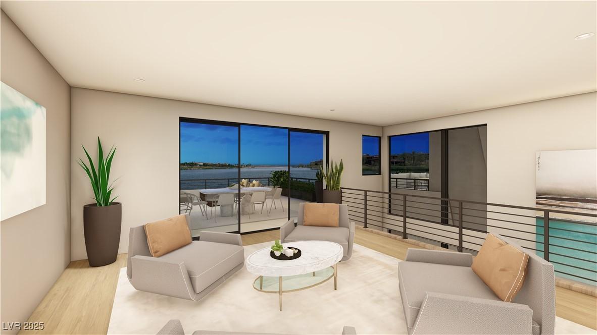 Image 4: Living room featuring wood finished floors and a w