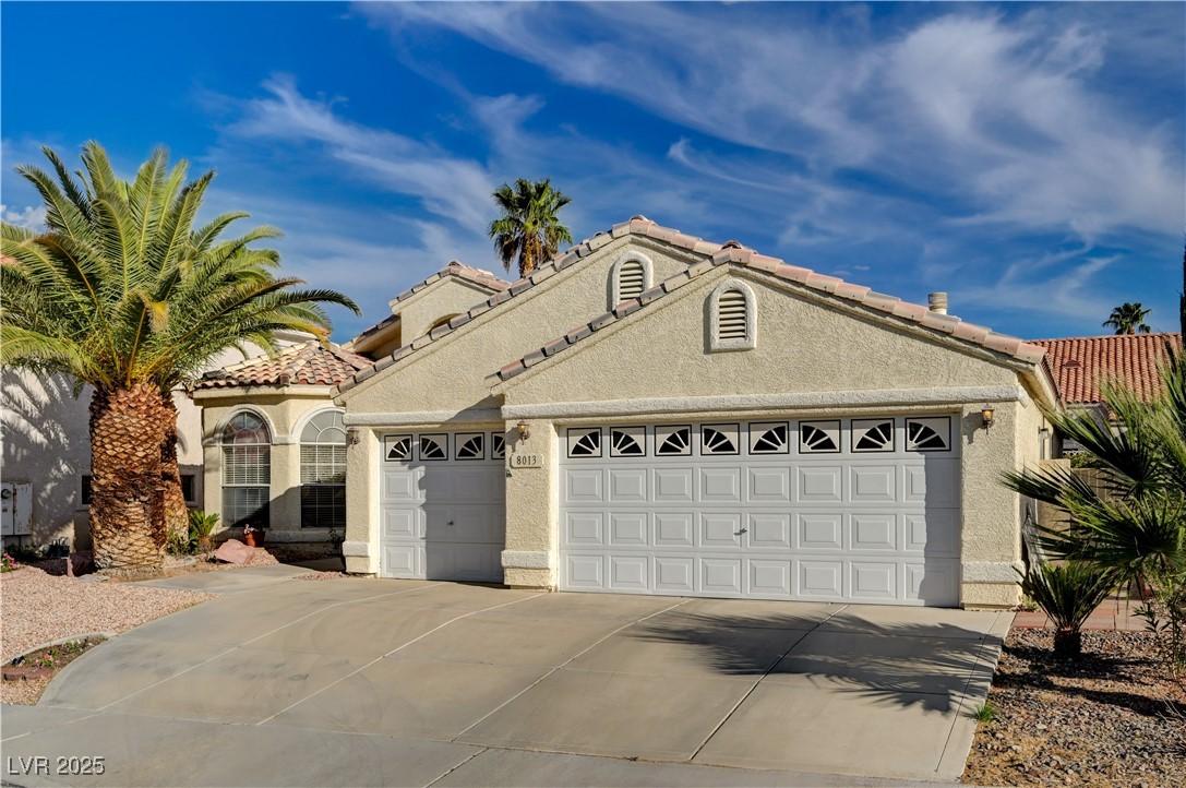Image 3: Mediterranean / spanish home with stucco siding, c