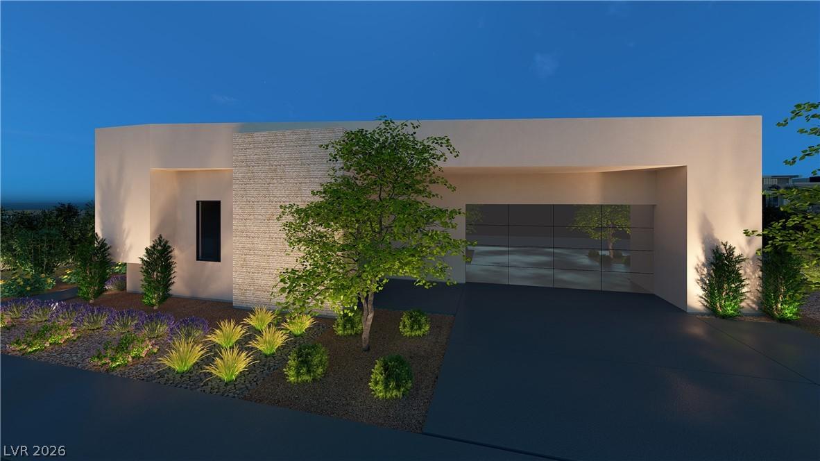 Image 2: Modern architecture is illuminated by evening land