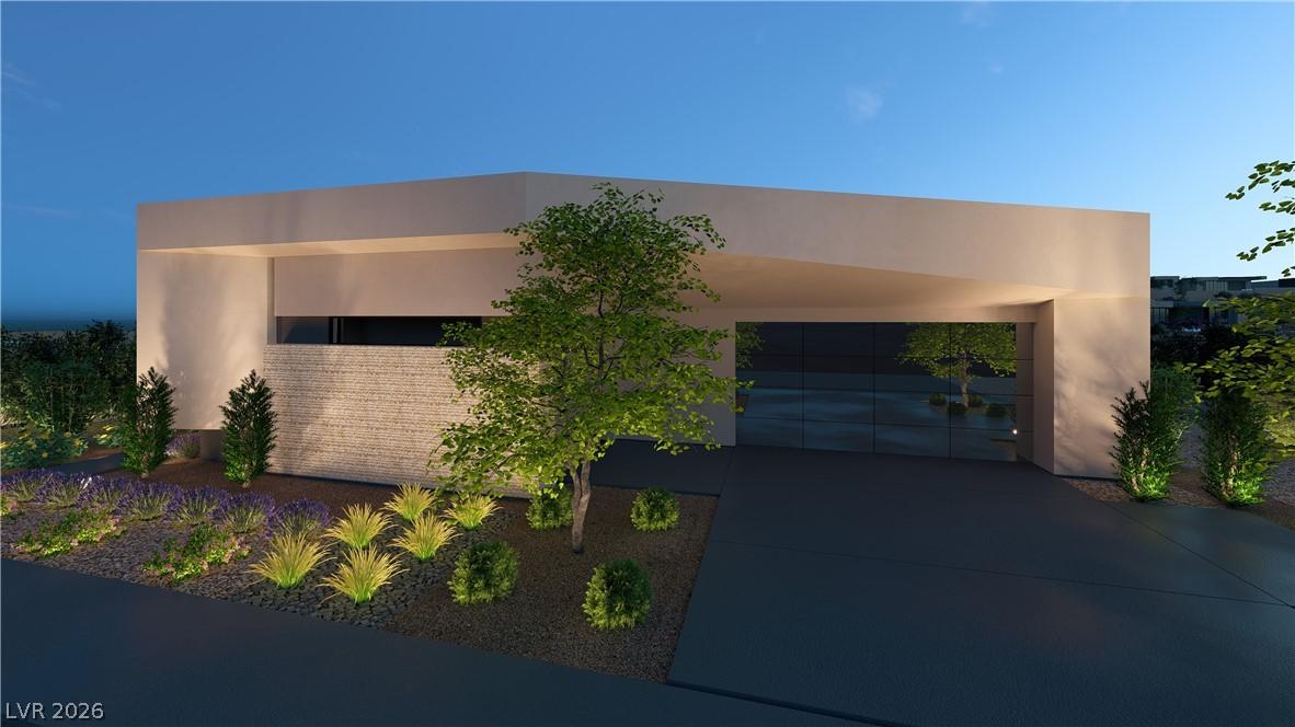 Image 3: A striking modern facade with architectural lighti