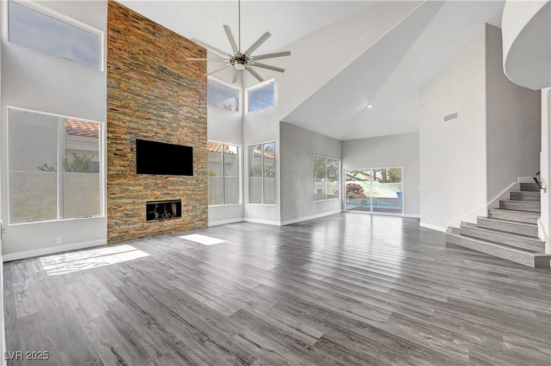 Image 3: Unfurnished living room with baseboards, ceiling f