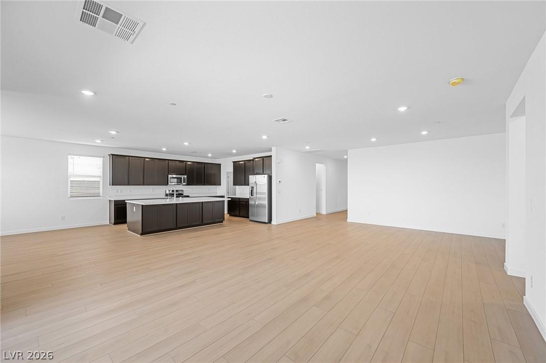 Image 4: An open floorplan seamlessly connects the well-app