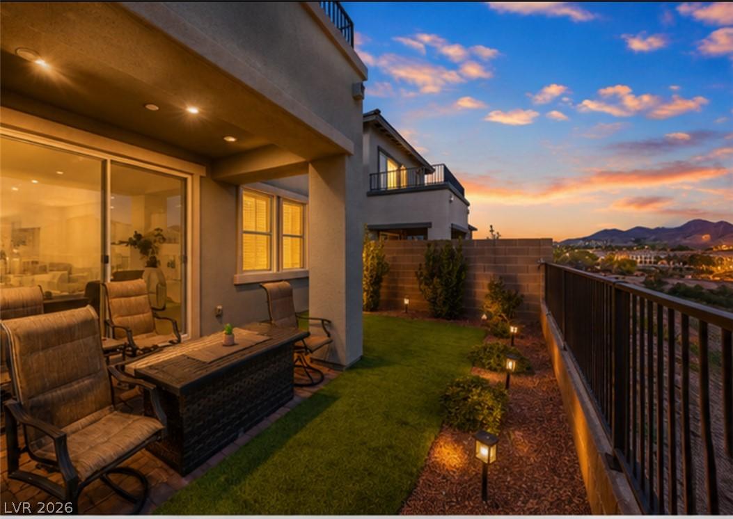 Image 4: Unwind on the outdoor patio with breathtaking view