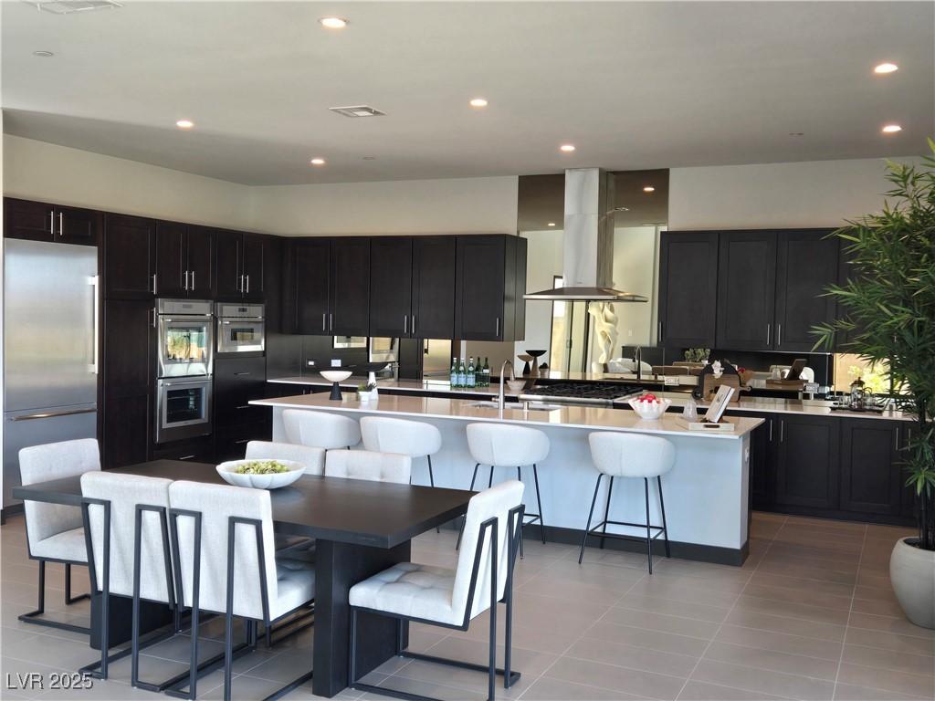 Image 3: Kitchen featuring stainless Thermador appliances,