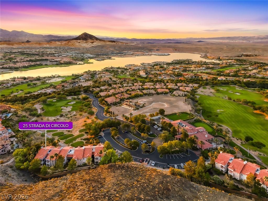 Image 4: Breathtaking views encompass a lake, golf course,