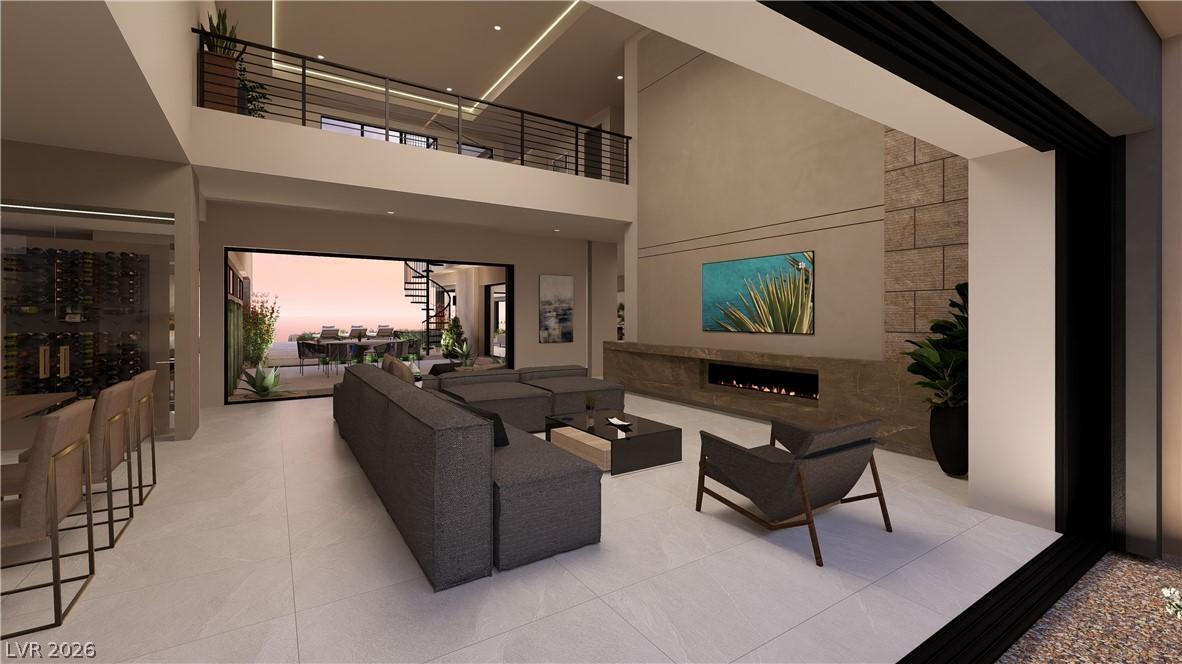 Image 3: An open-concept living space with a contemporary f