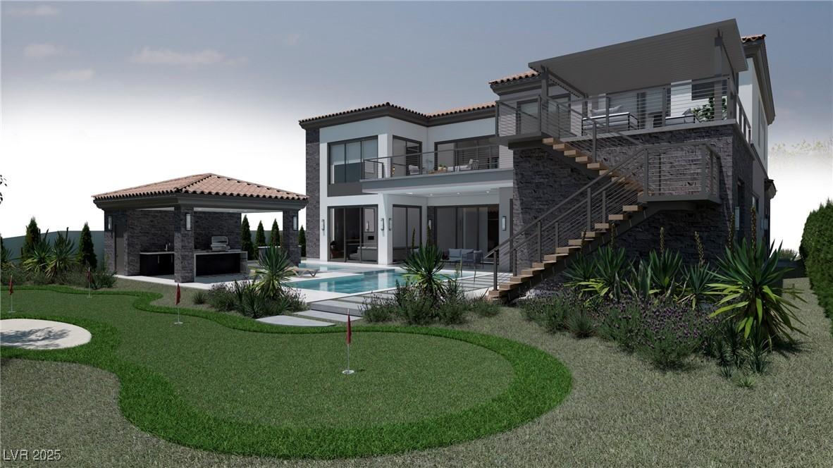 Image 3: Back yard featuring outdoor kitchen, mini golf, gr