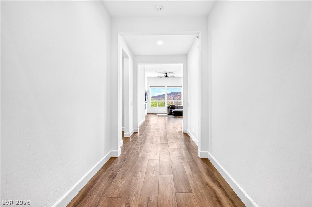 Image 4: A welcoming hall leads to a living space framed by
