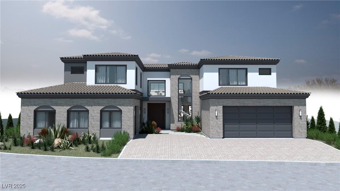 Image 2: View of front of home featuring a tiled roof, deco