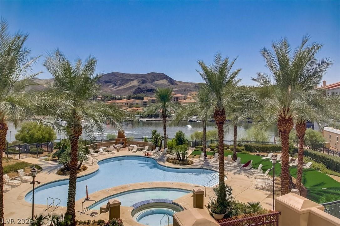 Image 2: This outdoor oasis features a refreshing pool and