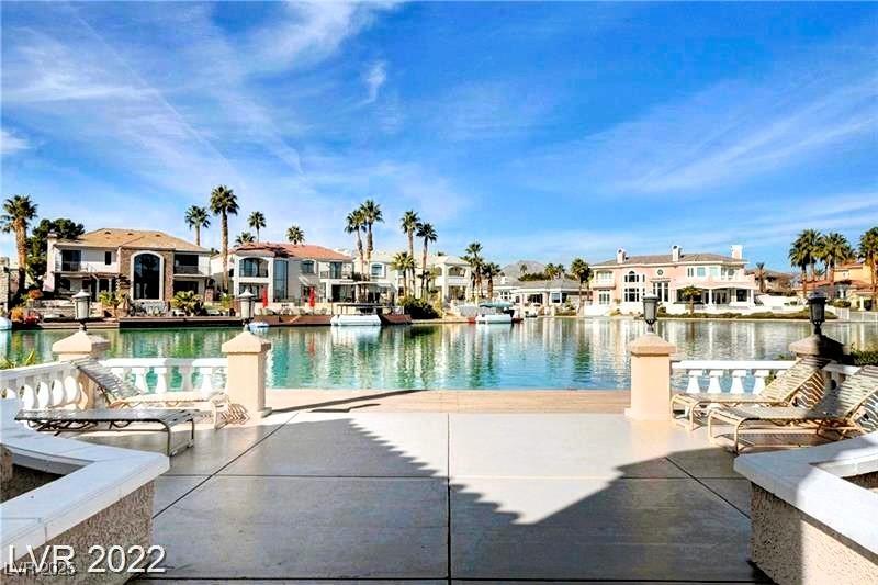 Image 2: View of the lake featuring a residential view and