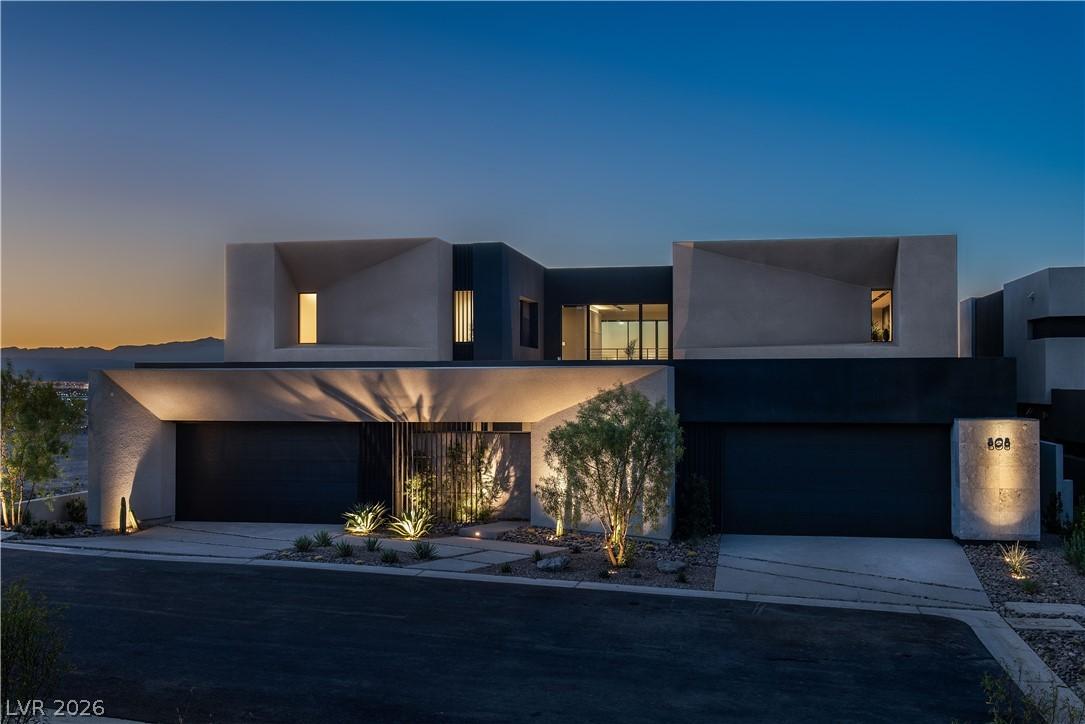 Image 1: Modern architecture glows at twilight with integra