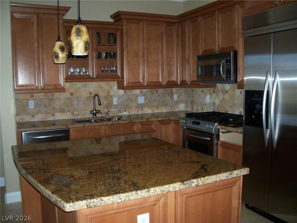Image 4: Kitchen with appliances with stainless steel finis