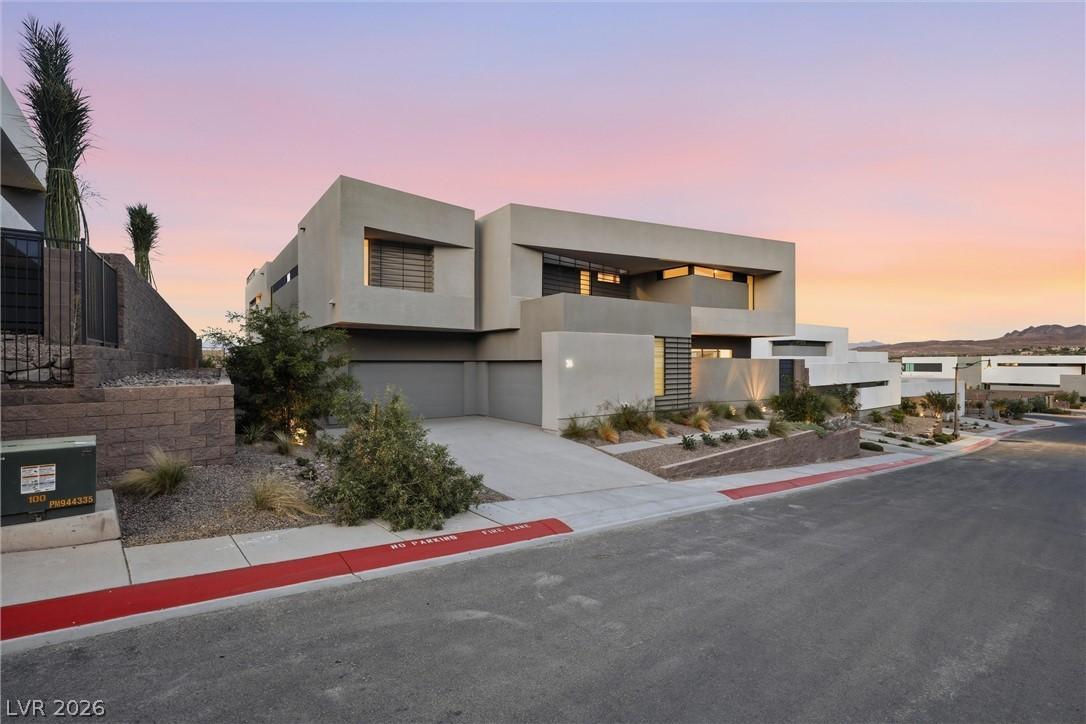 Image 2: Dramatic modern architecture with clean lines and
