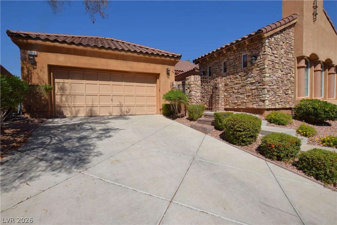 Image 1: A stone facade and tiled roof enhance the curb app