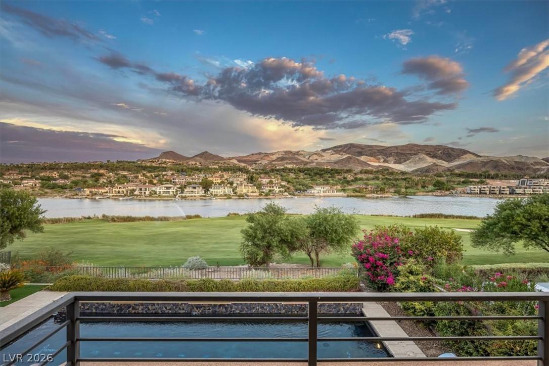 Image 4: A striking elevated view showcases a serene lake,