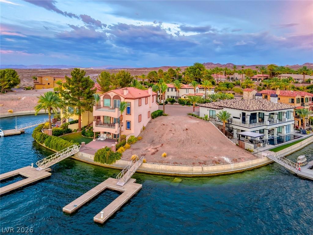 Image 1: Aerial view showcasing waterfront residences with