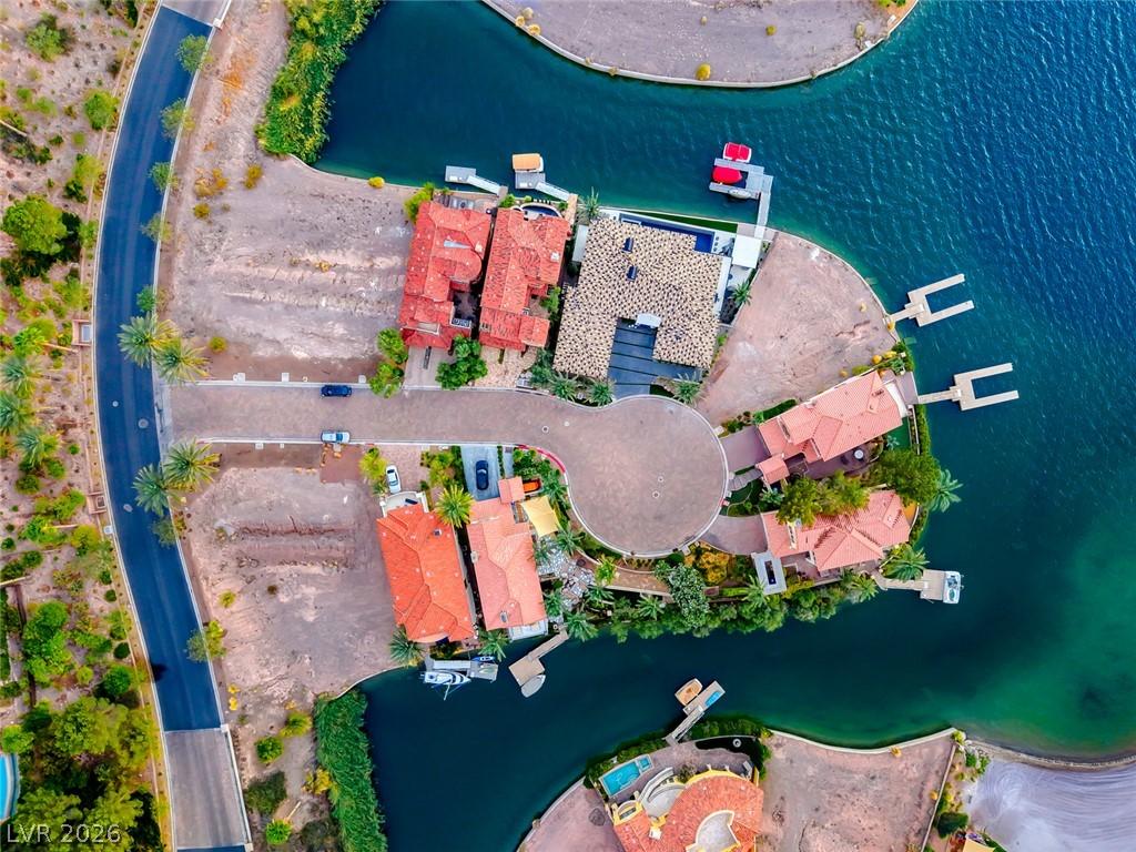 Image 3: An aerial perspective showcases waterfront homes w