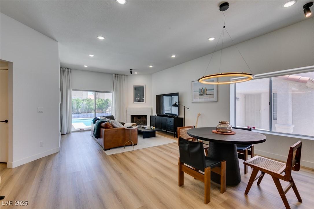 Image 2: Dining space with light wood-type flooring, recess