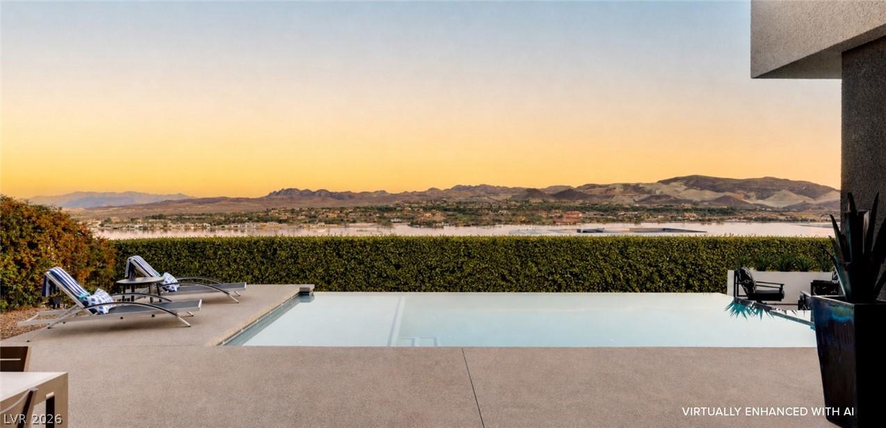 Image 4: An inviting pool area offers relaxation with capti
