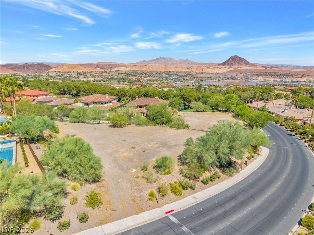 Image 2: An aerial panorama reveals a vast residential canv