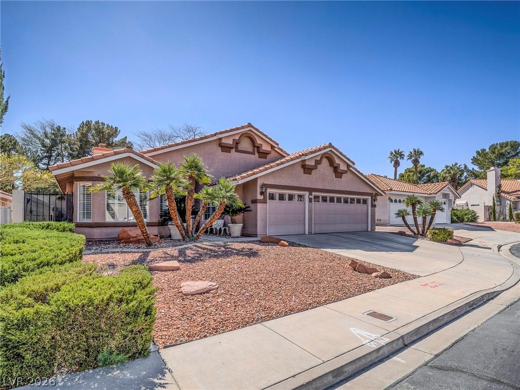 Image 2: Mediterranean / spanish house featuring a garage,