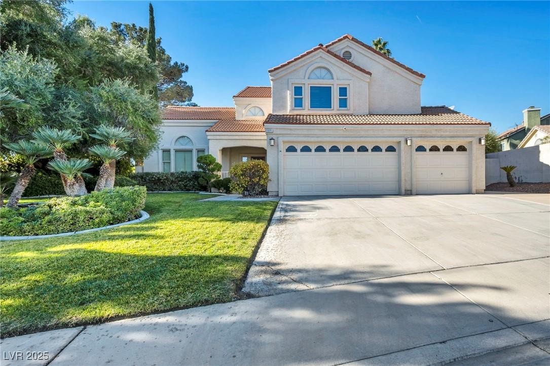 Image 2: Home faces East- 3 car garage