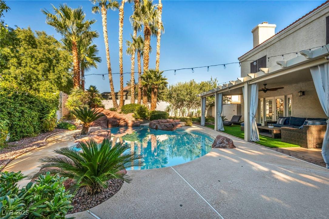 Image 4: Pool/Spa with Waterfall- Backyard Patio Covered