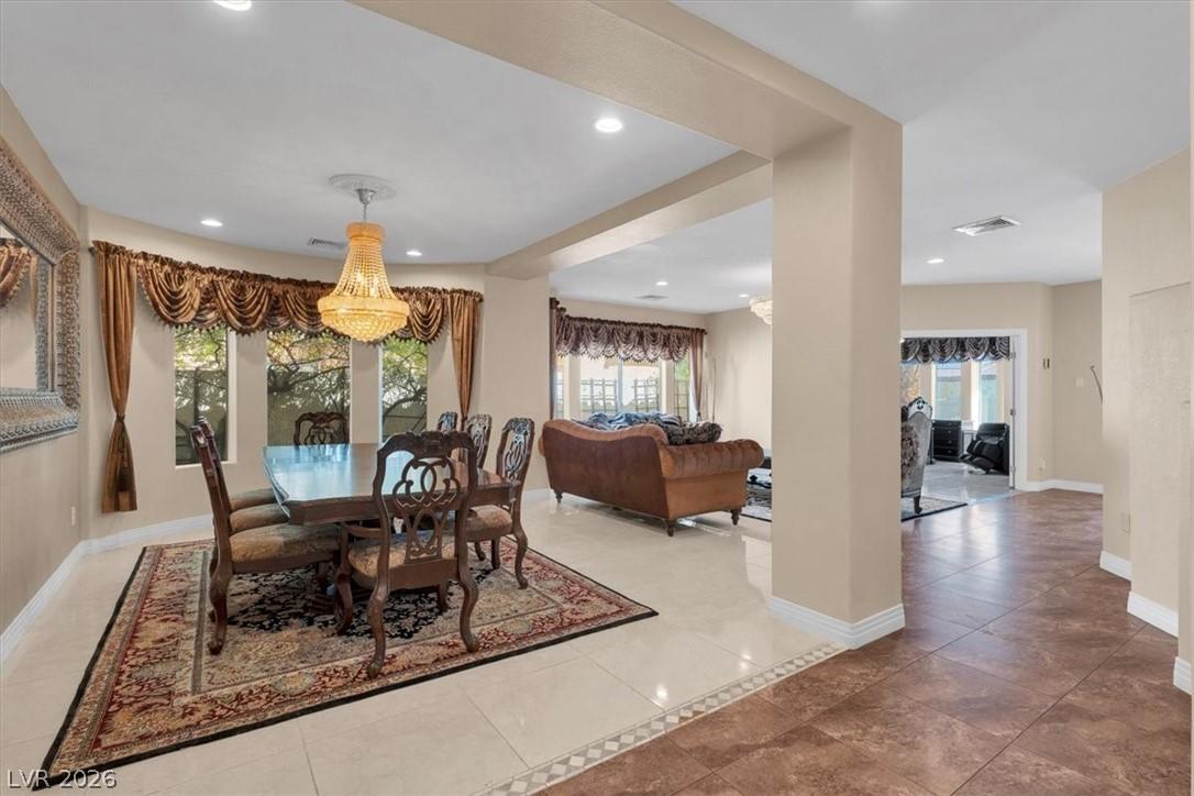 Image 3: Elegant dining area and living space seamlessly co