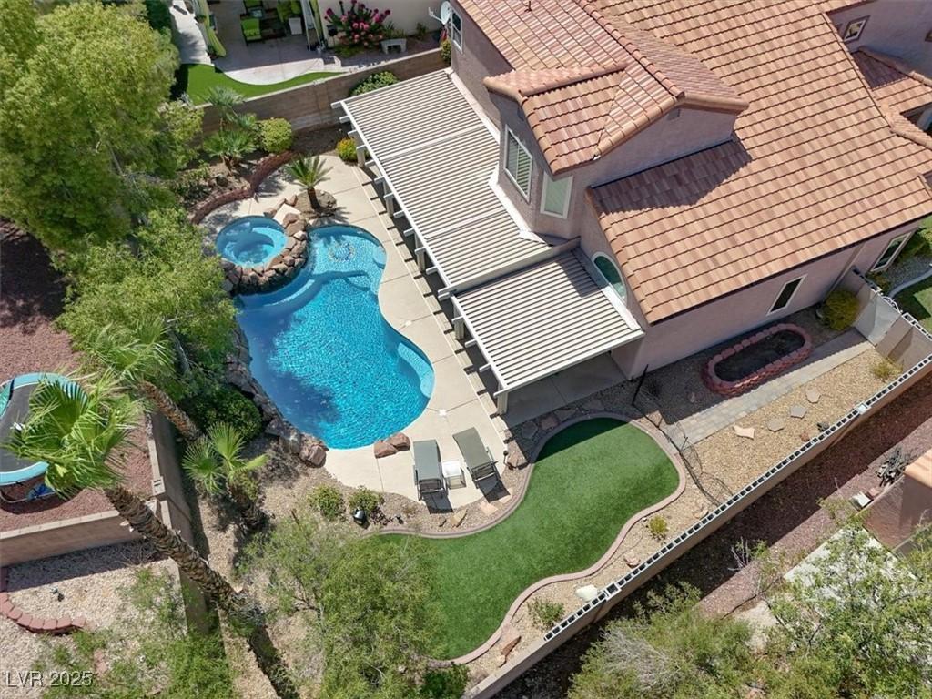 Image 4: Backyard Aerial View of backyard and top of covere