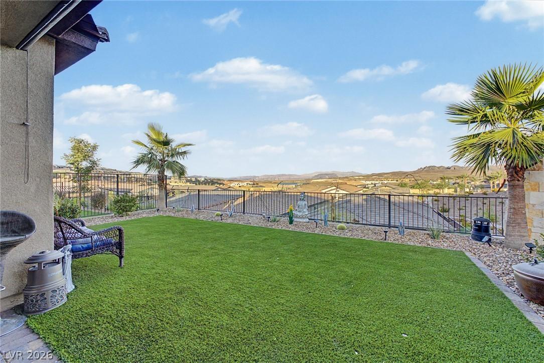 Image 2: Enjoy an expansive outdoor area with a mountain vi