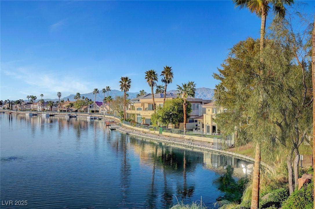 Image 2: Water view with a residential view