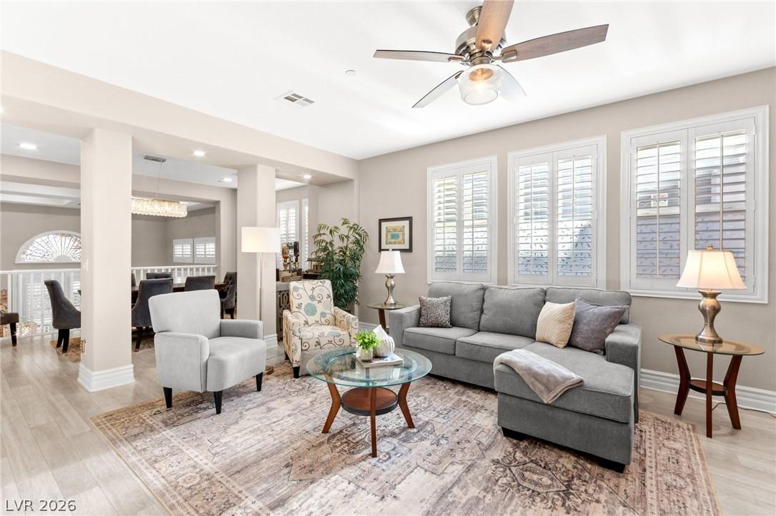 Image 4: An inviting gathering space features an open floor