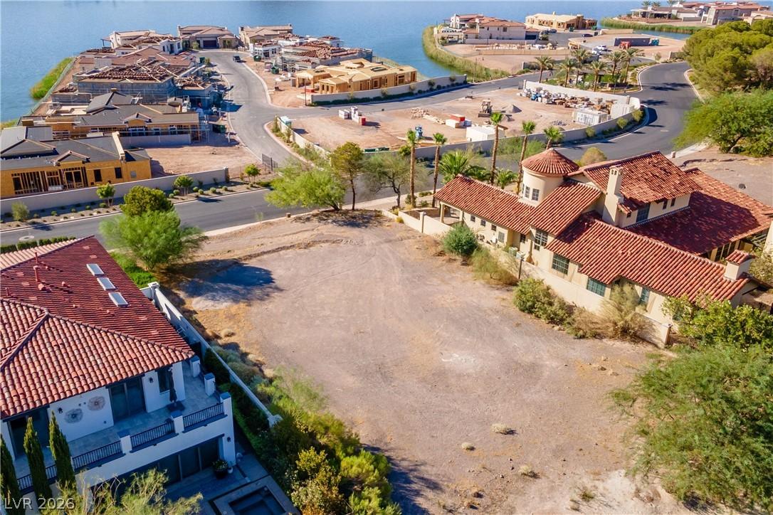 Image 2: A spacious lot offering lake views and surrounded
