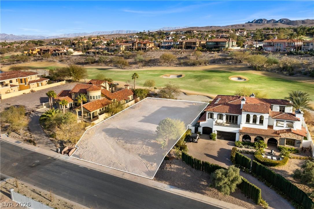 Image 3: An aerial perspective reveals a prime vacant lot n