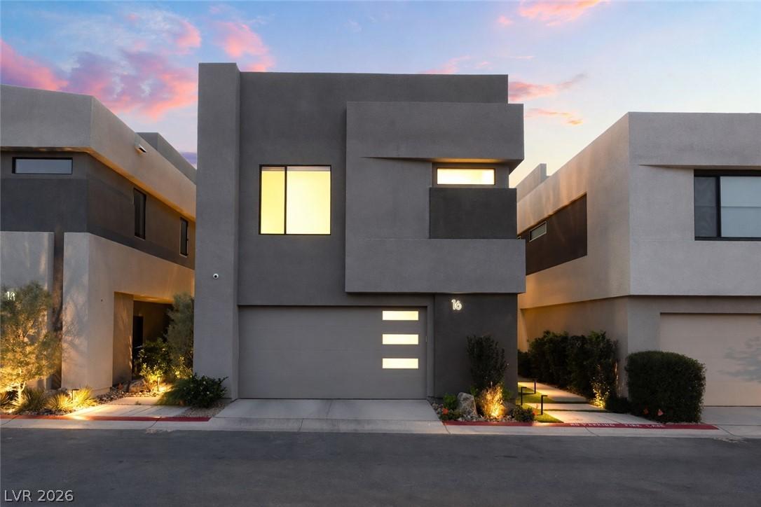 Image 4: Bold geometric architecture with accent lighting c