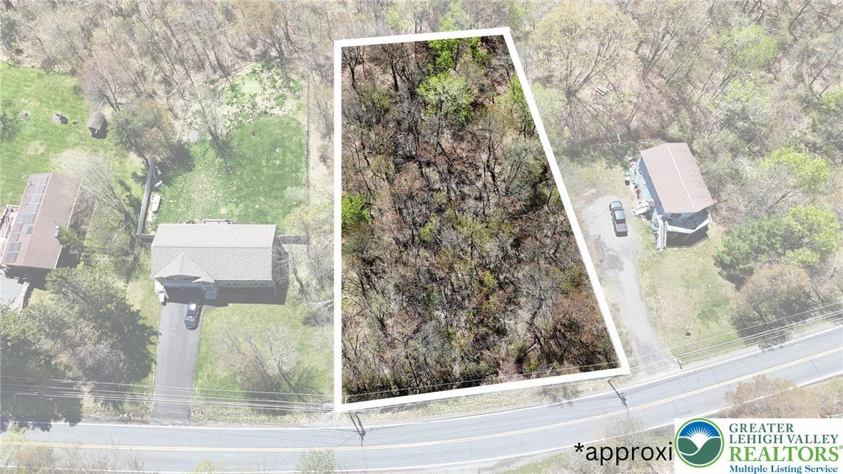 Image 1: Aerial View/Approximate Lot Lines