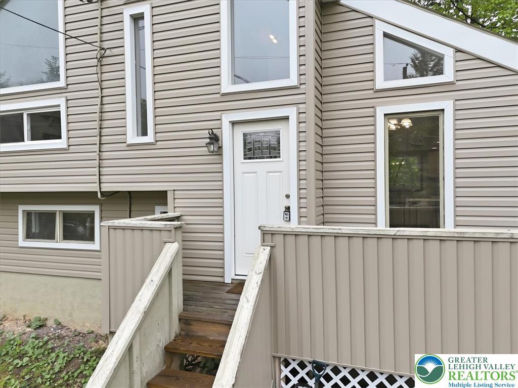 Image 2: A welcoming entry invites you into this home, show