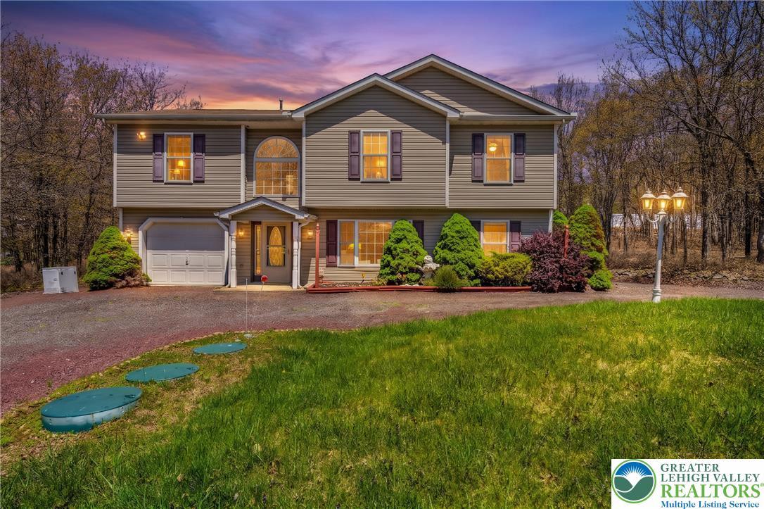 Image 2: This beautiful residence offers spacious living, a