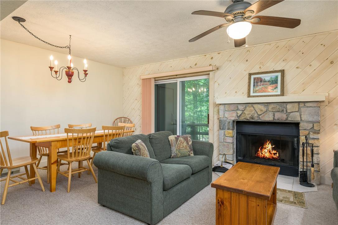 Image 4: A welcoming interior with a cozy fireplace, perfec