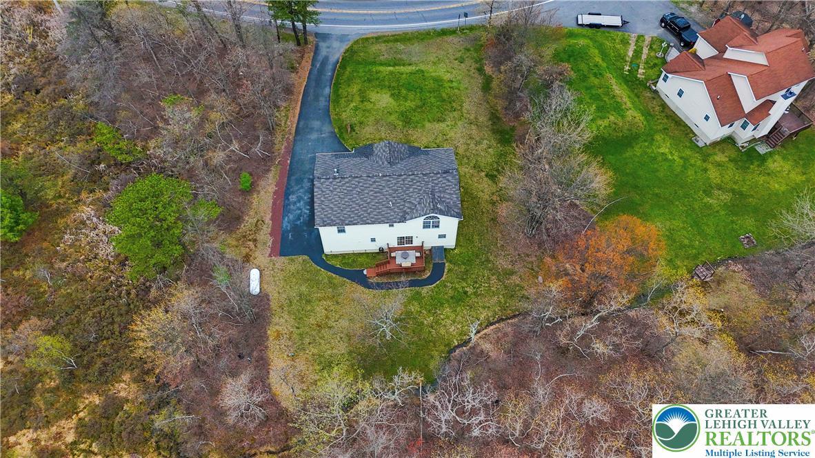 Image 2: An aerial perspective reveals a private home nestl