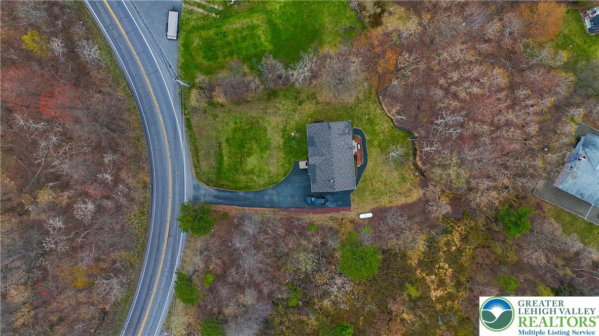Image 4: An aerial perspective reveals a private residence