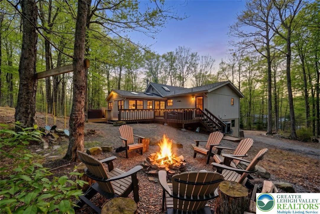 Image 3: Tree-Lined Backyard w/ Fire Pit
